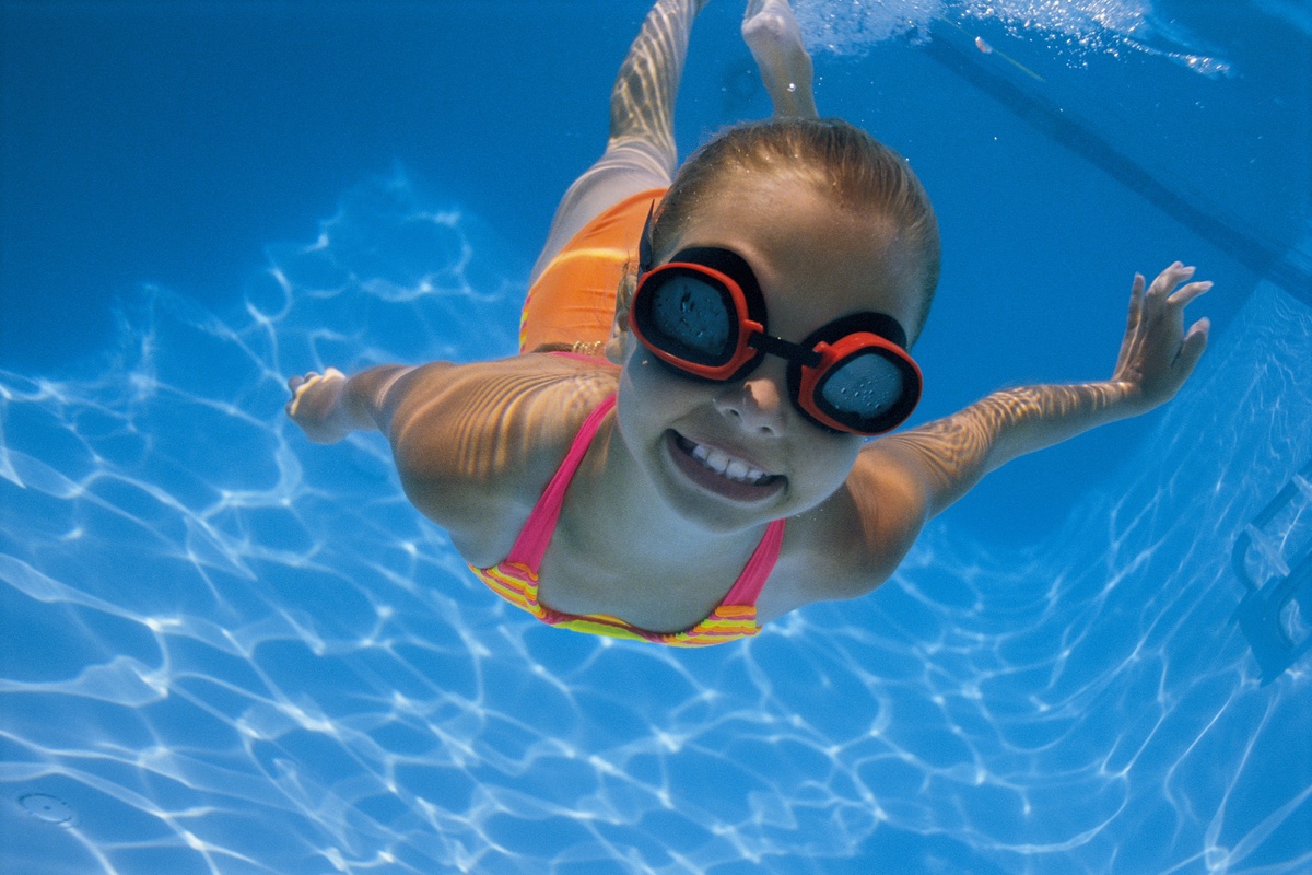 Child learning to swim